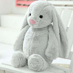 gros lapin en peluche gris
