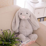 lapin peluche gris
