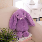 lapin peluche mauve