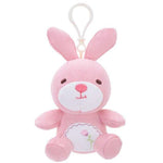 lapin rose en peluche
