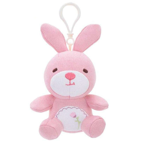 lapin rose en peluche