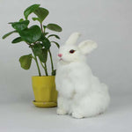 peluche lapin assis blanc