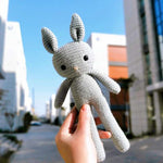 peluche lapin gris modele