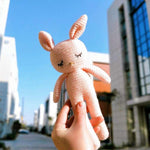 peluche lapin rose modele