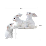 sculpture moderne lapins blancs taille