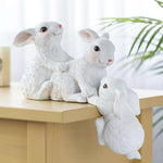 sculpture moderne lapins blancs