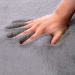 tapis effet peau de lapin gris demo